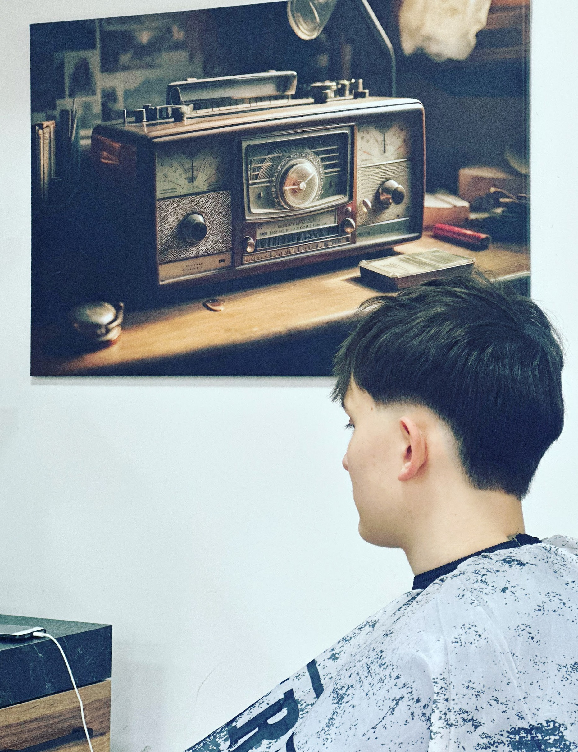 Herenkapsel in de stoel van Mo’s Barbershop